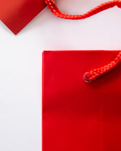 Load image into Gallery viewer, Red Bottle Bag, Close up of Cord Handle and Tag
